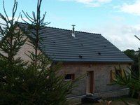 Maison  bois vue sur les volcans