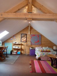Maison  bois vue sur les volcans