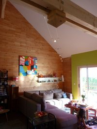 Maison  bois vue sur les volcans