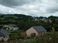 Maison  bois vue sur les volcans