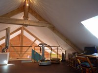 Maison  bois vue sur les volcans