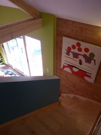 Maison  bois vue sur les volcans